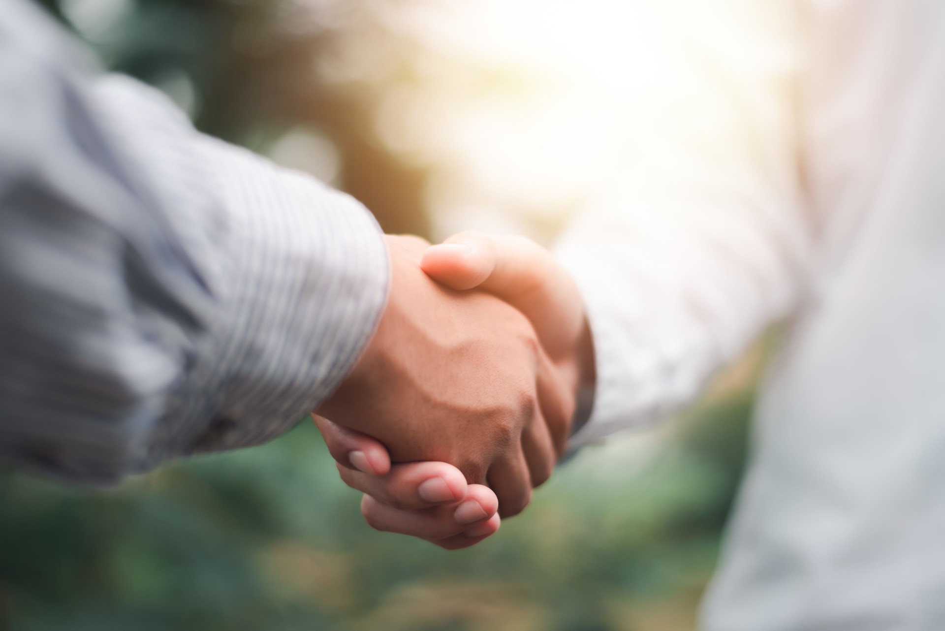 Businessmen shaking hands to indicate a business deal,successful contract management of the company,signing an agreement,business partner,New opportunities for the future of the industry,joint venture
